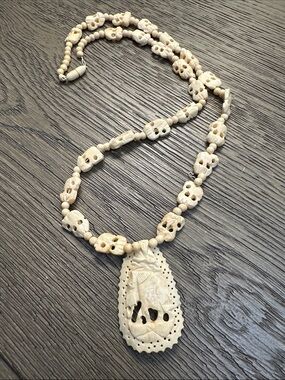 Carved Ivory-Color Floral Pendant Necklace